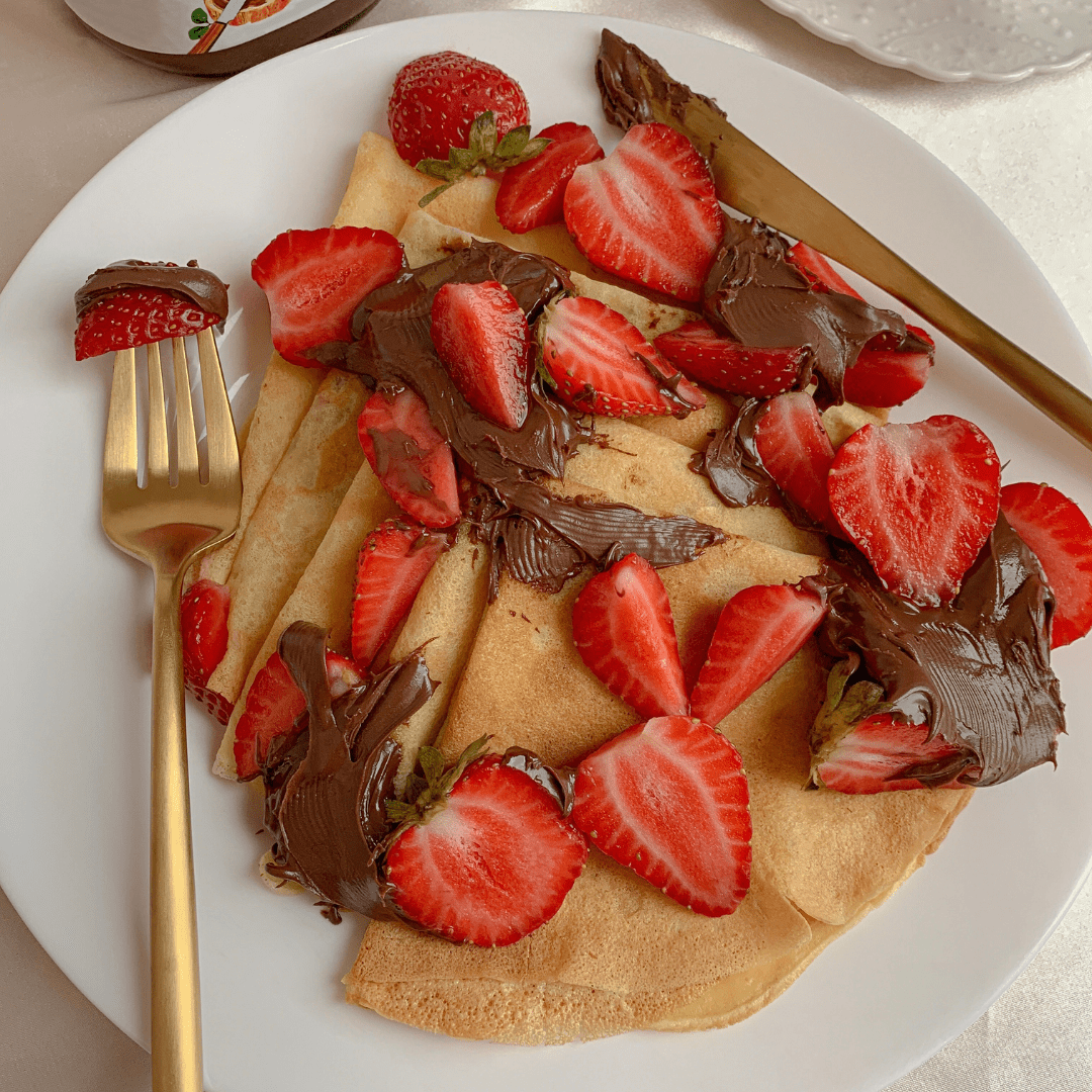 french crepes with Nutella and strawberries