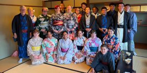 Business students on a GLO faculty-led study abroad program walking through an international city